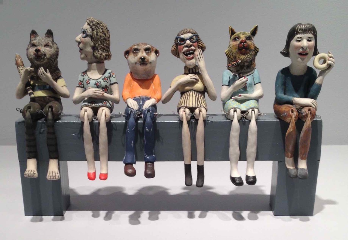Figures on bench